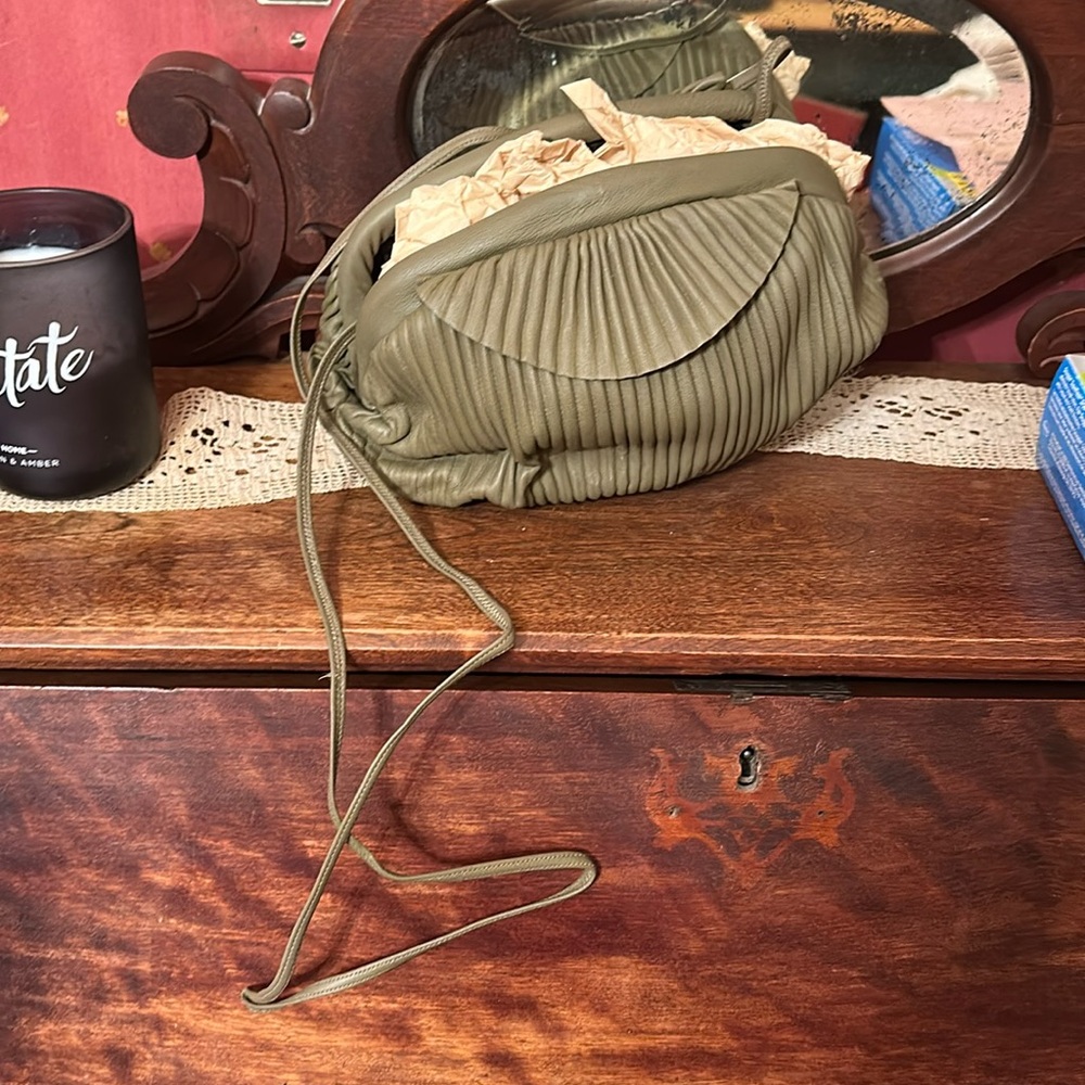 used olive green clutch